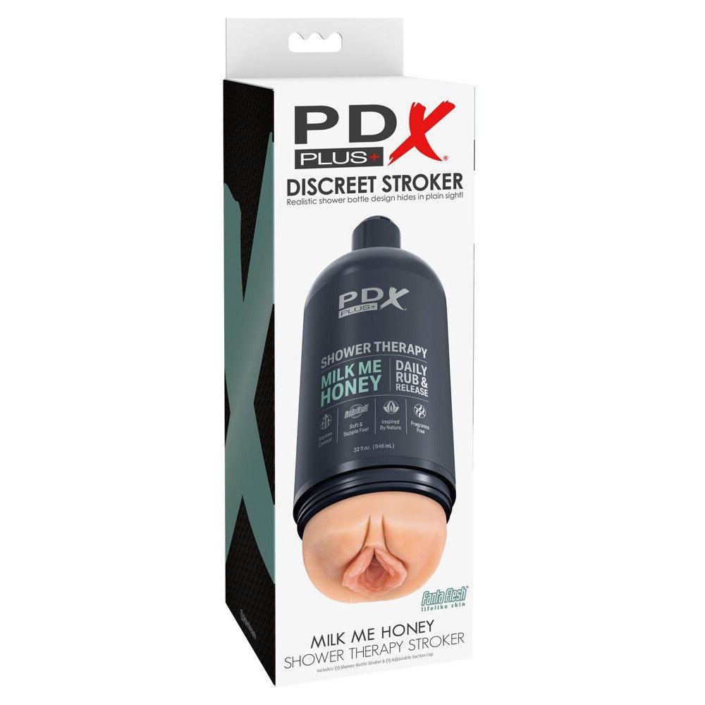 Realistic vagina masturbator in a discreet case with a PDX Milk Me Honey vacuum attachment